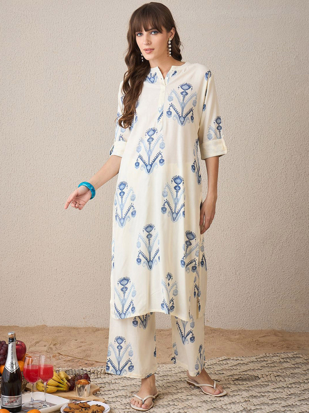 Women Printed Regular Kurta with Trousers