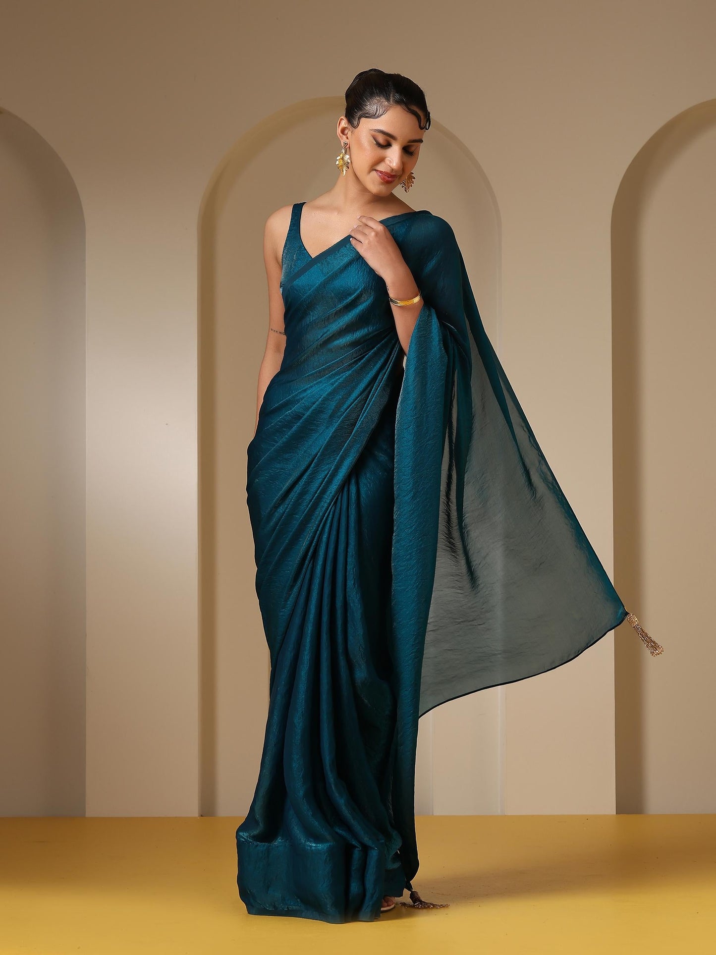 Dhiyona ST Metallic Peacock Blue Satin Saree with Self Blouse Fabric