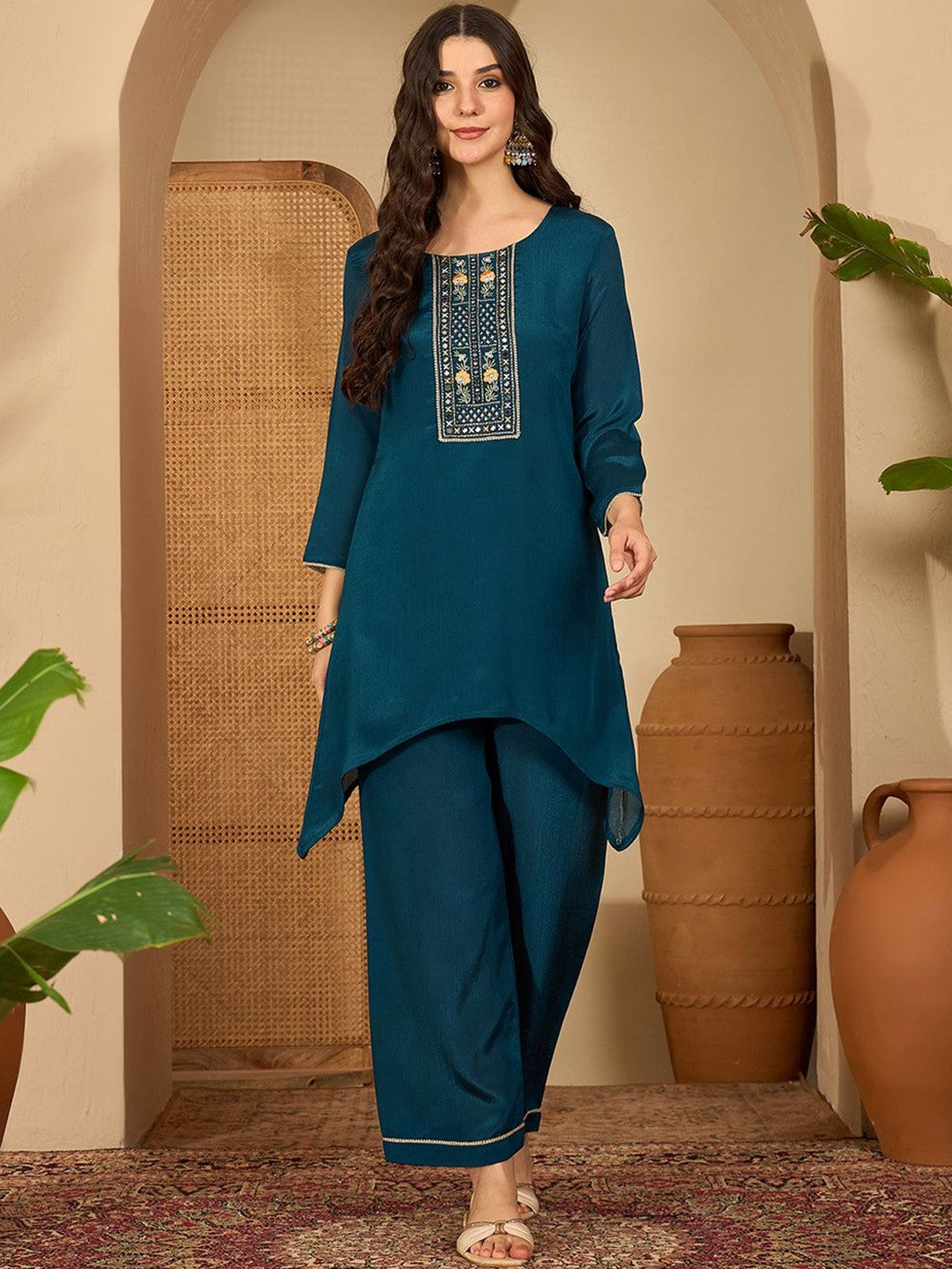 Women Ethnic Motifs Embroidered Asymmetric Sequinned Kurti with Palazzos