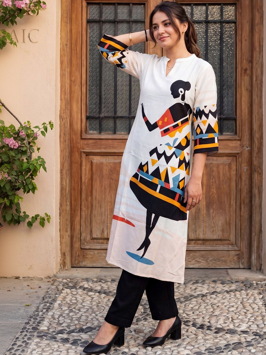 Women Printed Regular Kurta with Trousers
