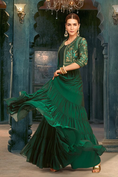 emerald green silk festive tiered anarkali dress Ayukha's anarkali dress with . It's a combination of & with long fitted chudi sleeves. The yoke is enhanced with silver
