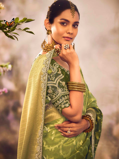 Dhiyona KM Women Green Silk Saree