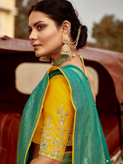 Dhiyona KM Women Graceful Green Silk Saree “ A Heritage Statement