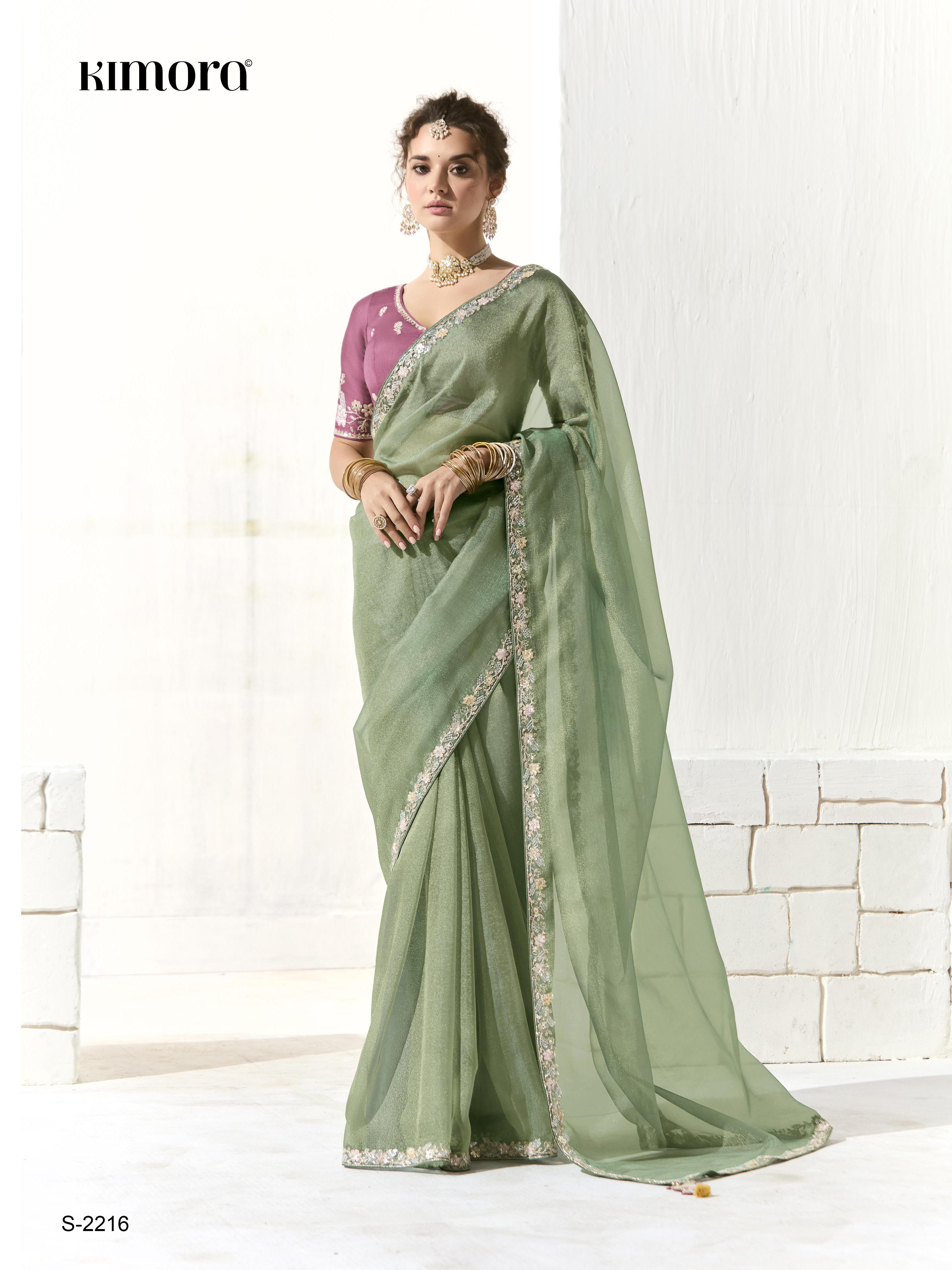 Dhiyona KM Women Mint Green Shimmer Saree With Ornate Mauve Purple Embroidered Blouse
