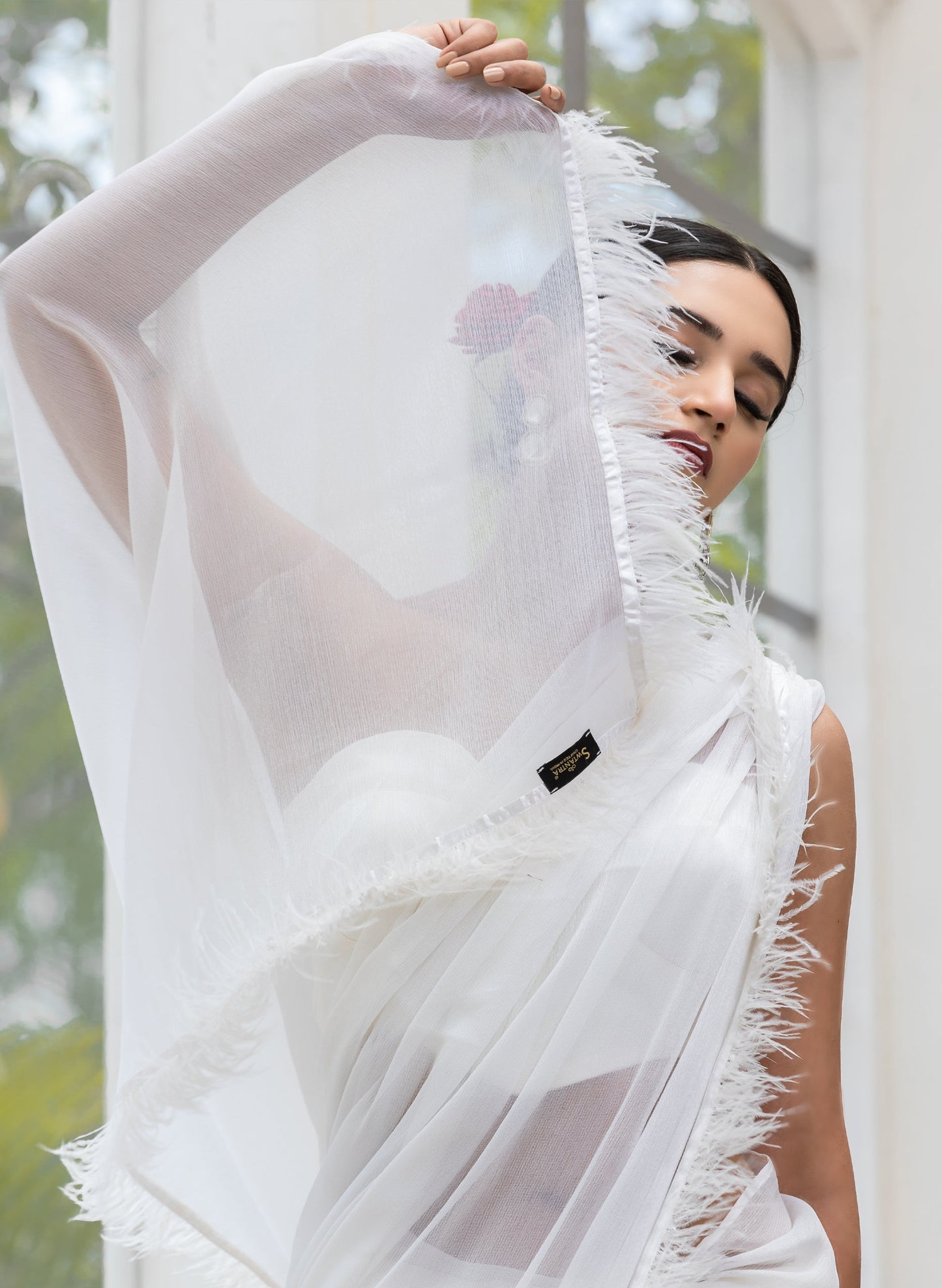 Dhiyona ST Gala Ready White Shimmer Saree with Faux Feathers and Blouse Fabric