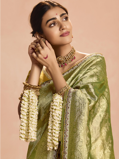 Dhiyona KM Women Radiant Green Kanjivaram Silk Saree With Ornate Yellow Blouse “ A Regal Ensemble