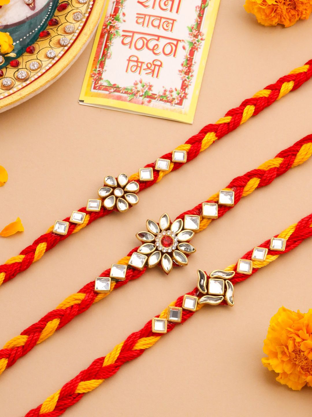 Dhiyona Set Of 3 Kundan Studded Floral Thread Rakhis With Roli Chawal Chandan & Mishri