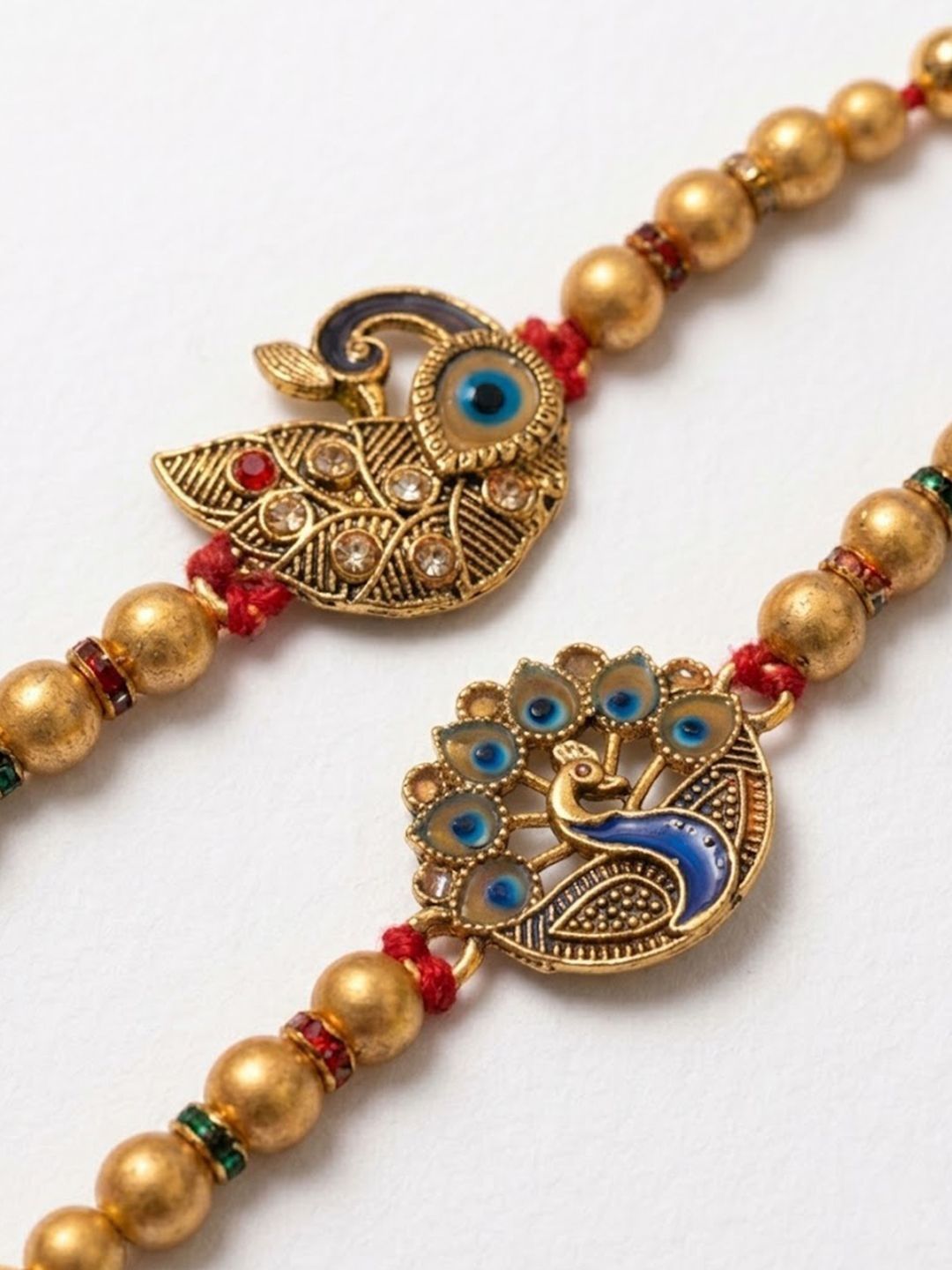 Dhiyona Set Of 2 Peacock & Ghungroo Design Multicolor Thread Rakhi With Roli Chawal Chandan