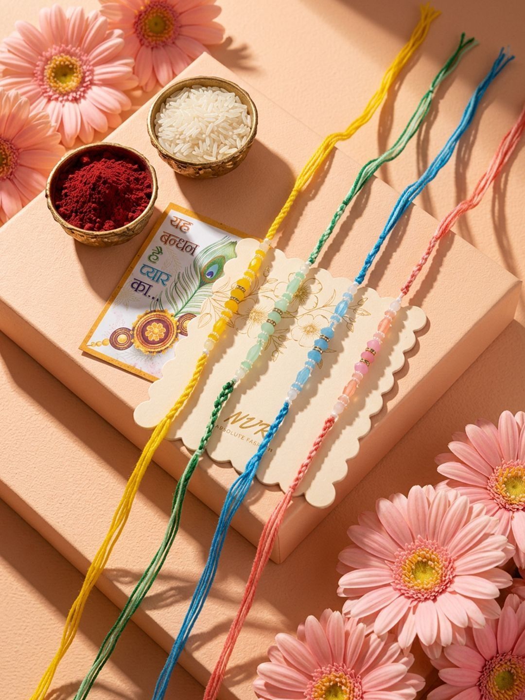 Dhiyona Set Of 4 Multicolor Artificial Beads Thread Rakhi With Roli Chawal Chandan Mishri