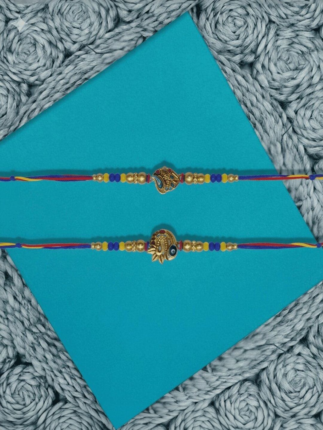 Dhiyona Set Of 2 Peacock Design Thread Rakhi With Roli Chawal Chandan Mishri
