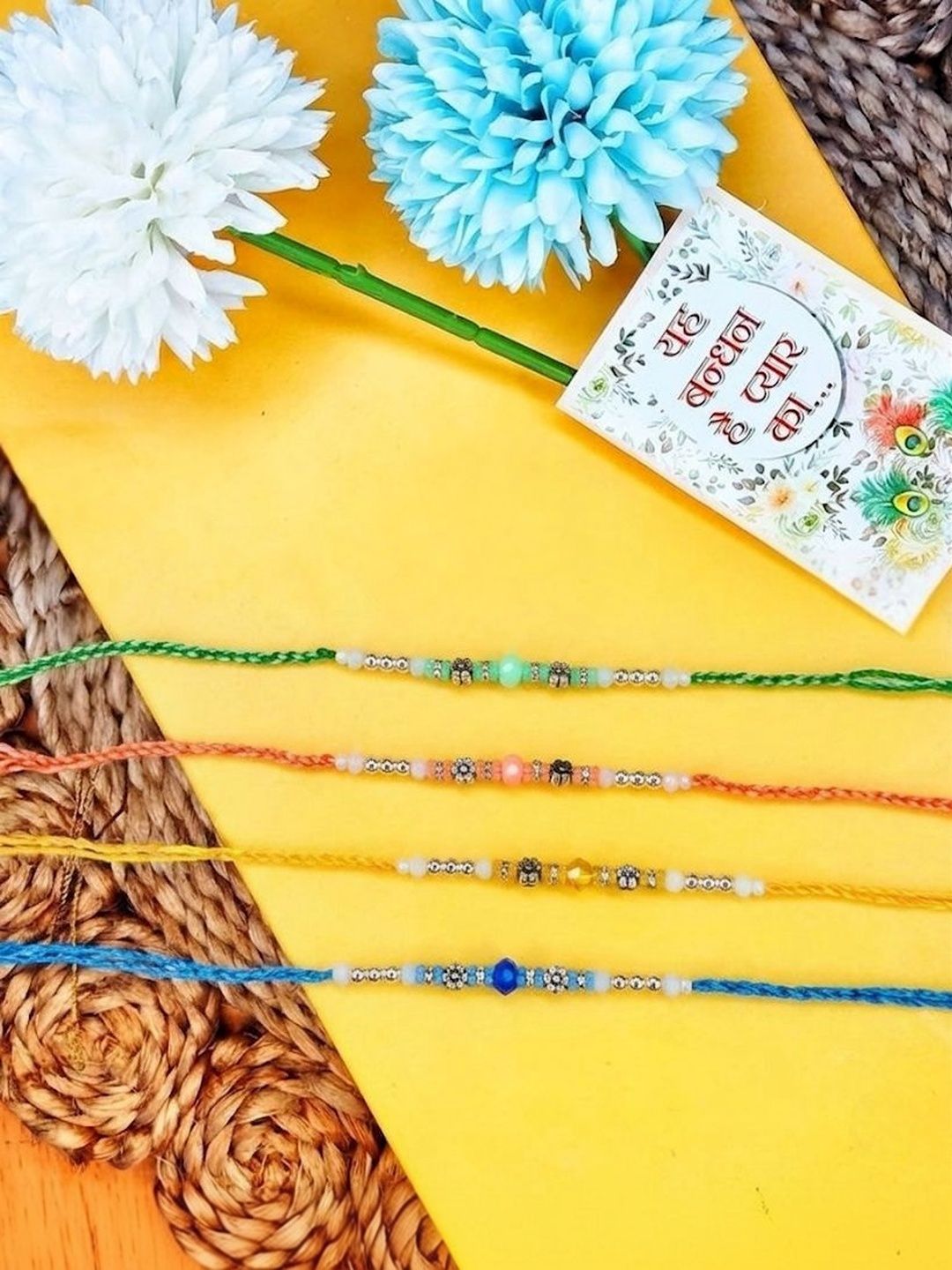 Dhiyona Set Of 4 Multicolor Artificial Beads Thread Rakhi With Roli Chawal Chandan Mishri