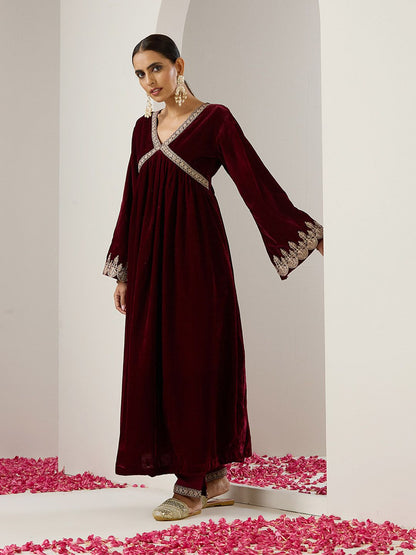 Dhiyona IS Women's Purple Ethnic Motifs Embroidered Flared Sleeves Velvet A-Line Kurta With Trousers