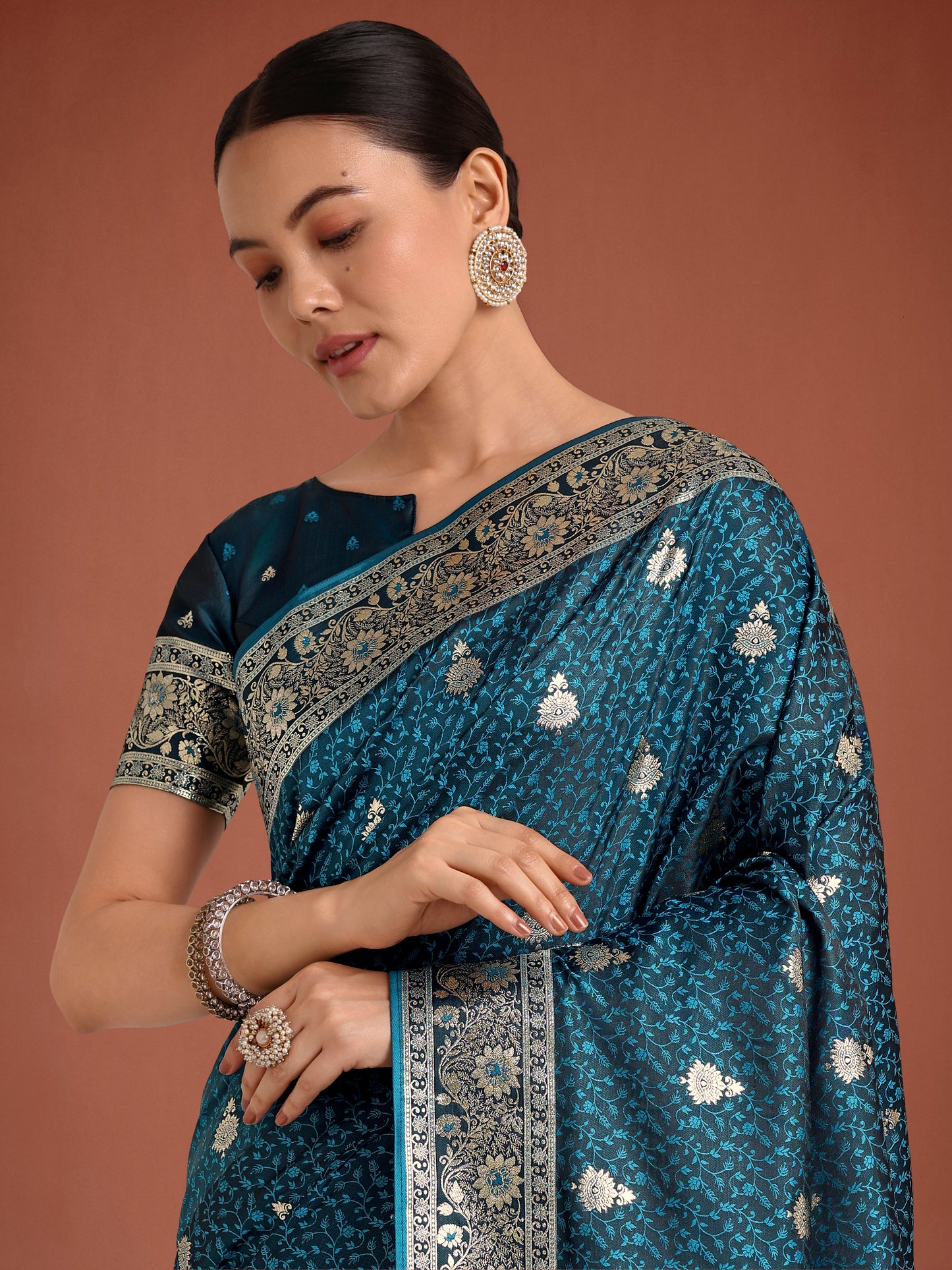 Dhiyona MJ Dark Teal Banarasi Satin Silk Saree with Intricate Zari Work with Rich Weaving Pattern