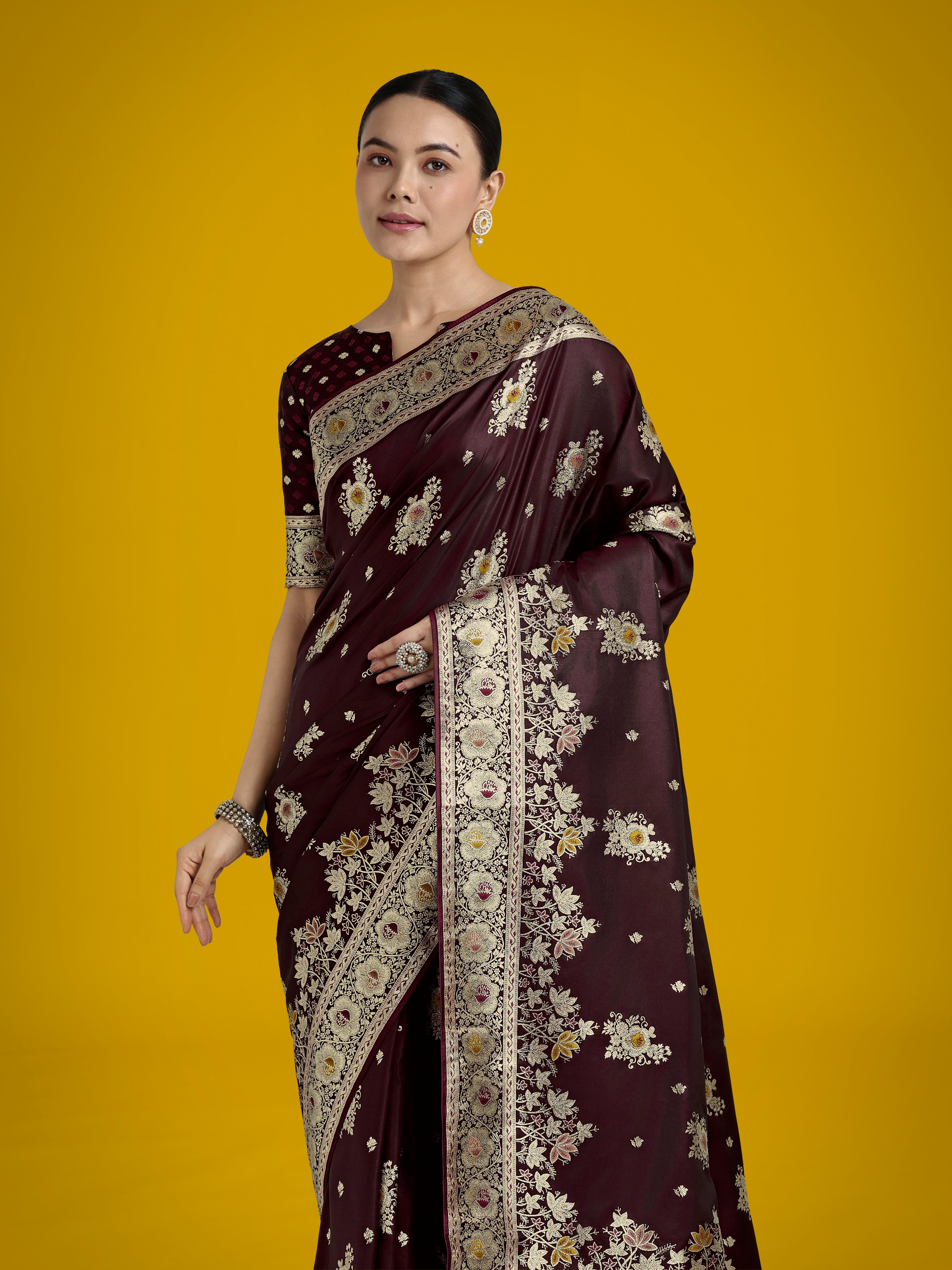 Dhiyona MJ Dark Maroon Glamour and Tradition With This Zari Woven Banarasi Satin Silk Saree