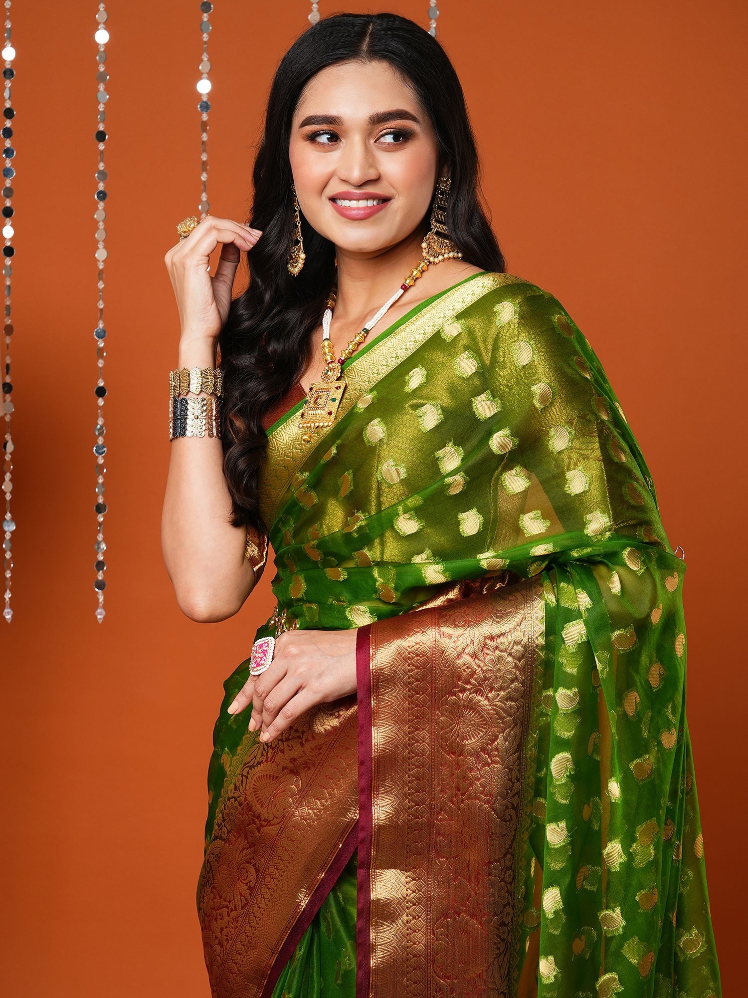 Women's Organza Green Woven Design Designer Saree With Blouse Piece