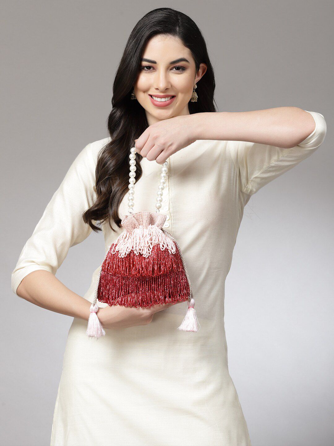 Dhiyona NR Embellished Tasselled Potli Clutch