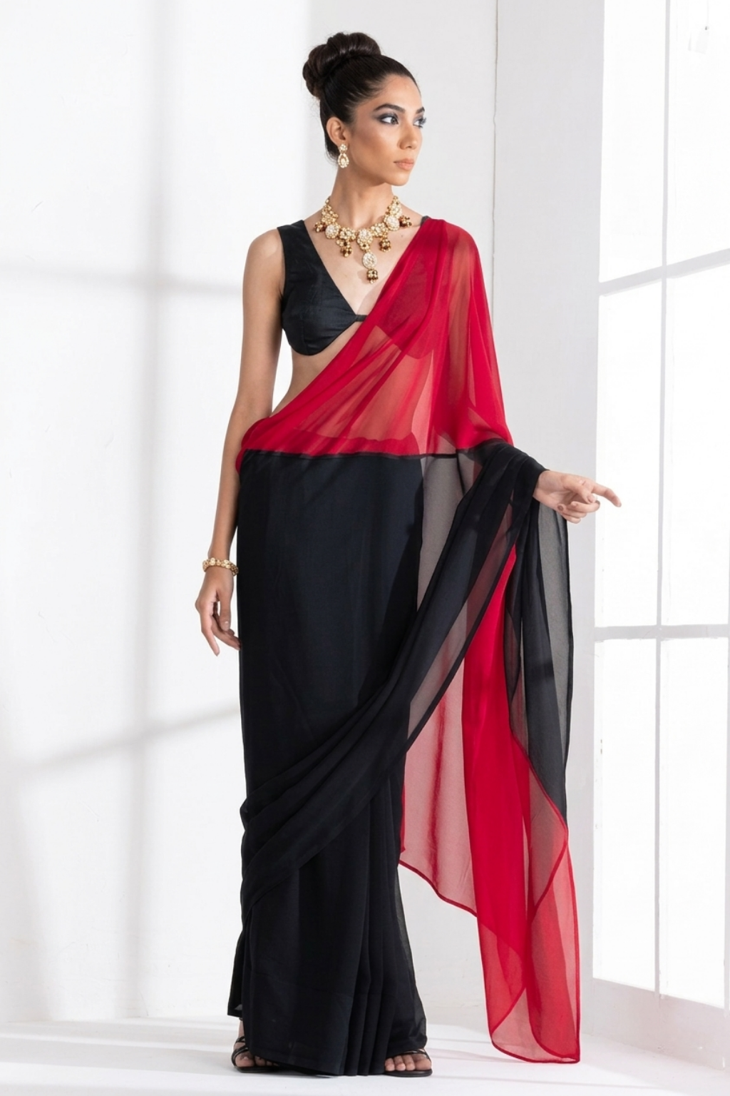 Dhiyona ST Black and Red Georgette Triangle Saree with Blouse Fabric