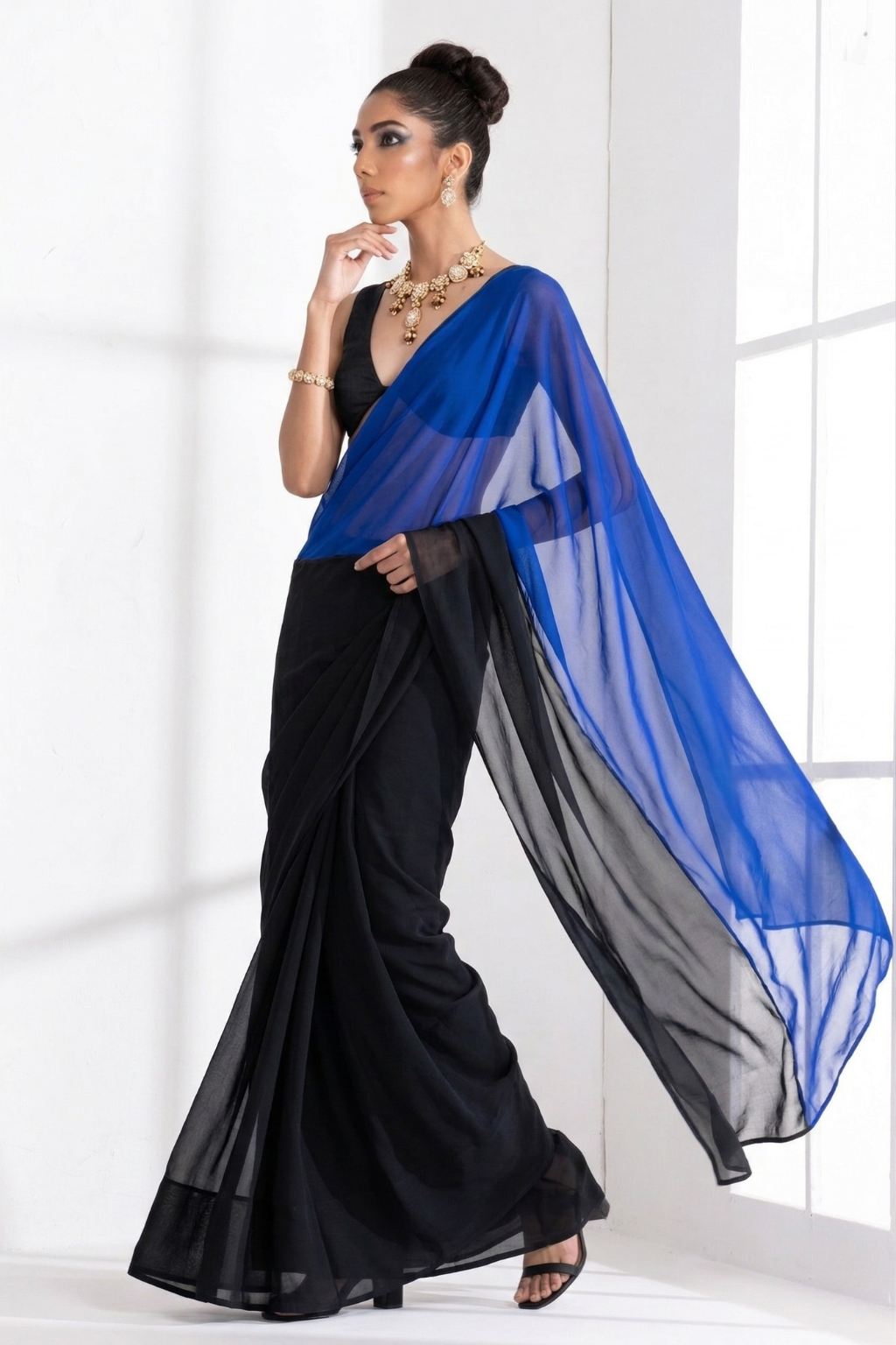 Dhiyona ST Black and Blue Georgette Triangle Saree with Blouse Fabric