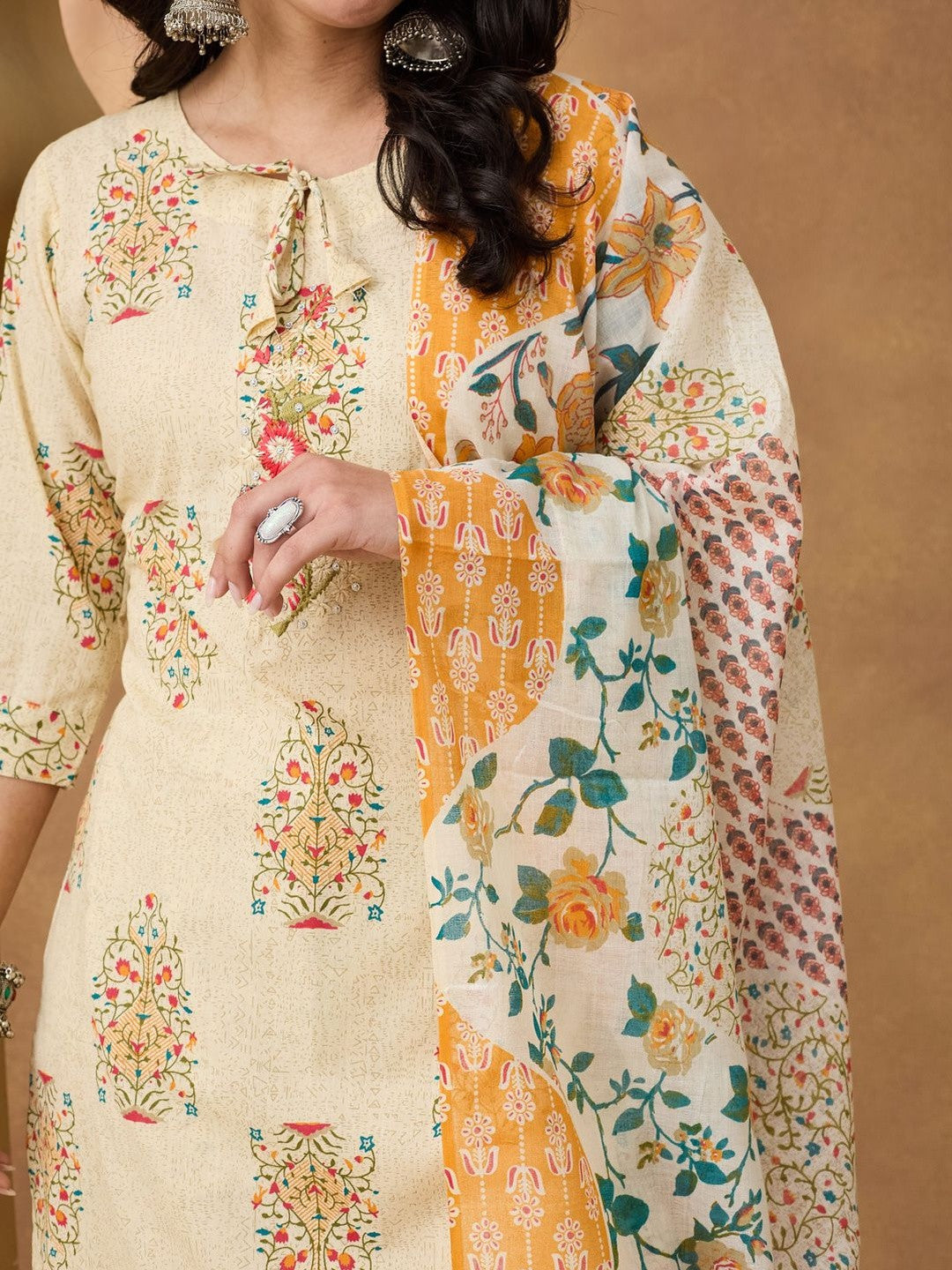 Beige Floral Cotton Printed Tie Neck Embroidery Kurta Trousers & Tasseled Dupatta