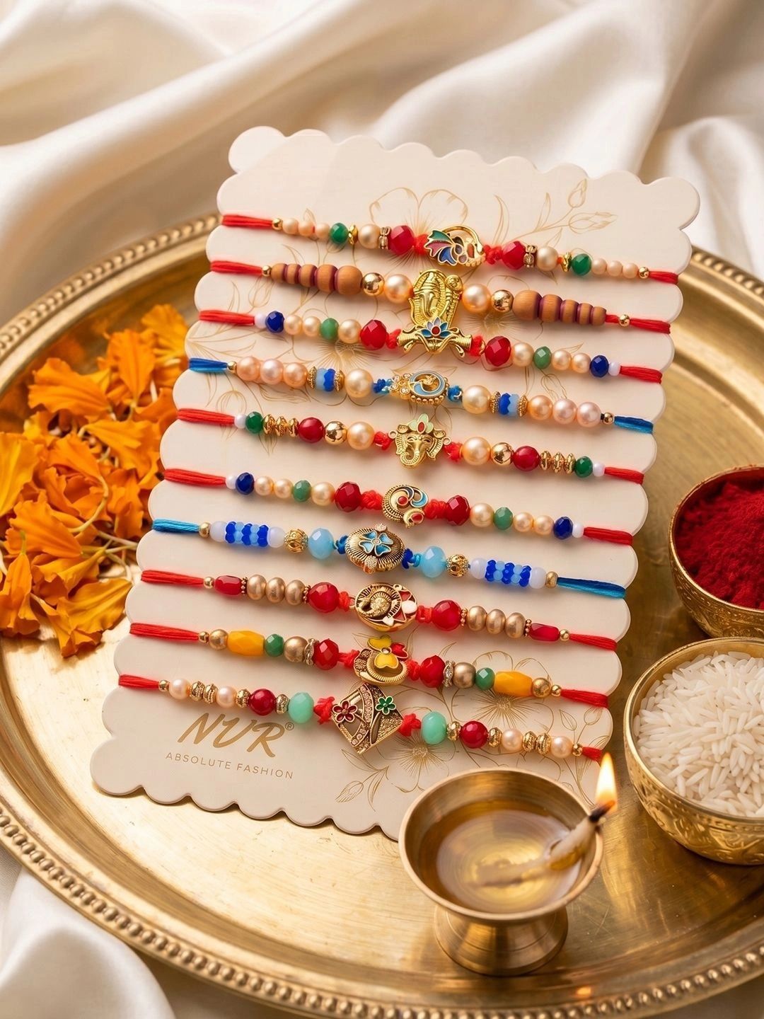 Dhiyona Set Of 10 Artificial Stones & Beads Thread Rakhi With Roli Chawal Chandan Mishri