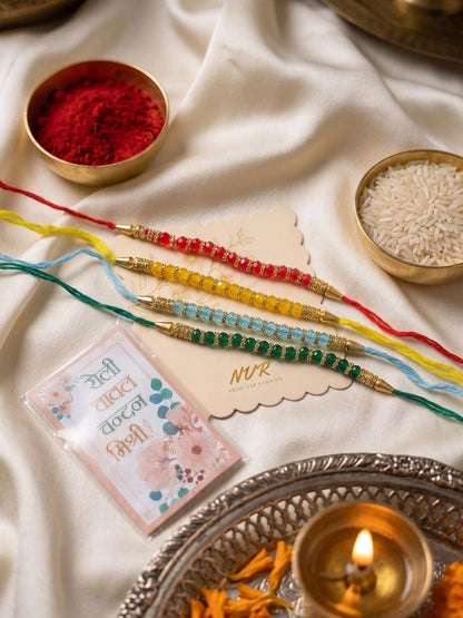 Dhiyona Set Of 4 Multicolor Artificial Beads Thread Rakhi With Roli Chawal Chandan Mishri