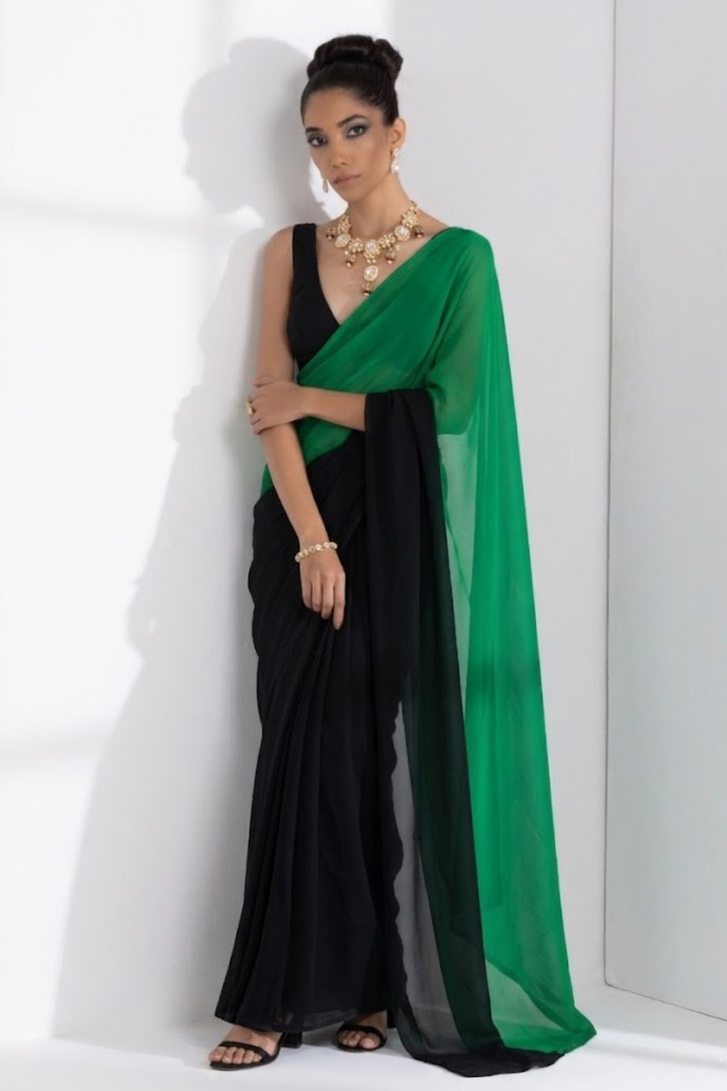 Dhiyona ST Black and Green Georgette Triangle Saree with Blouse Fabric