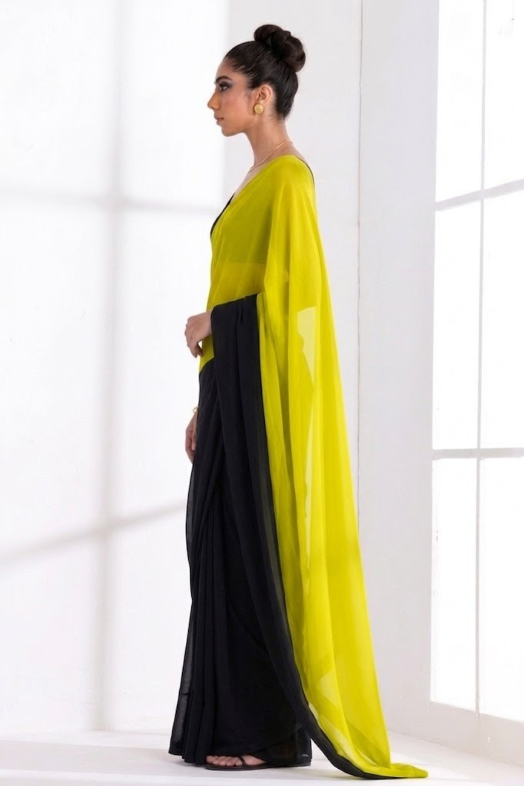 Dhiyona ST Black and Yellow Georgette Triangle Saree with Blouse Fabric