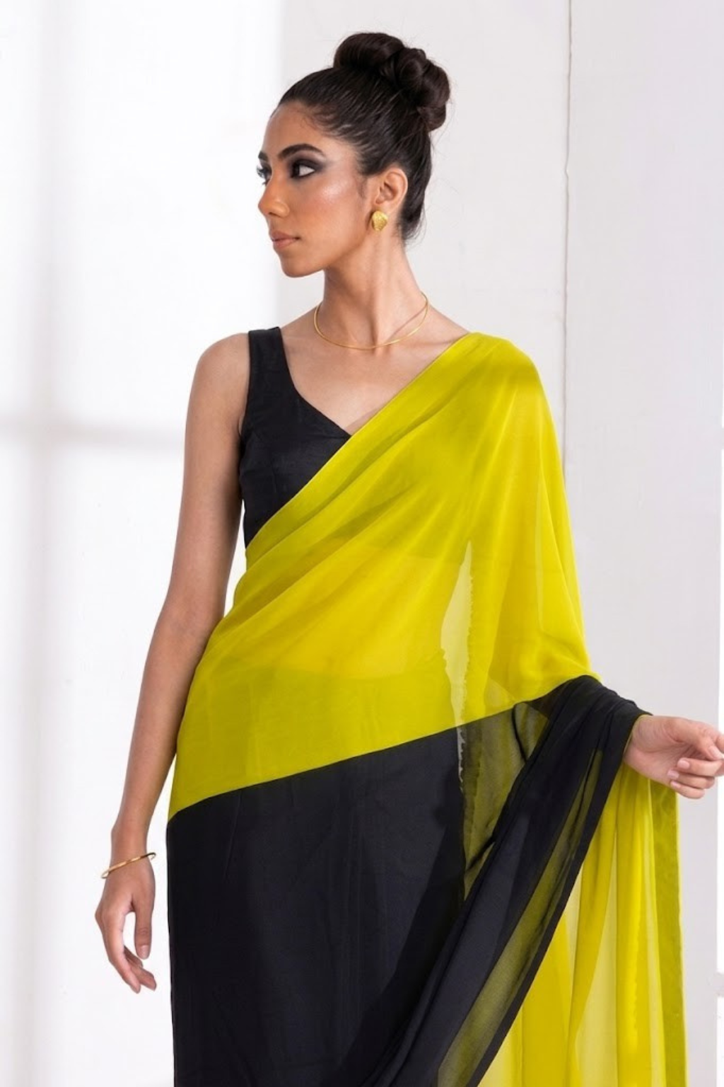Dhiyona ST Black and Yellow Georgette Triangle Saree with Blouse Fabric