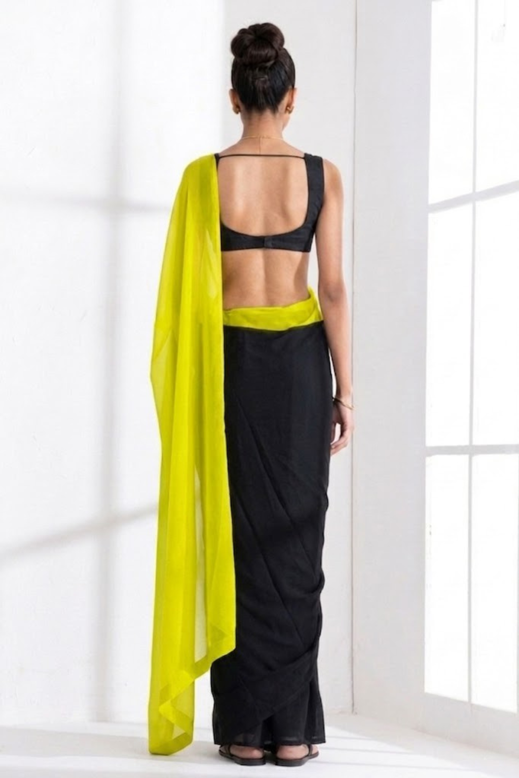 Dhiyona ST Black and Yellow Georgette Triangle Saree with Blouse Fabric