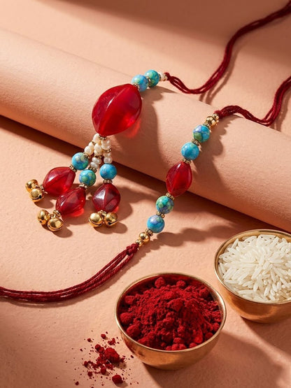 Dhiyona Set Of 2 Artificial Beads & Gold Toned Ghungroo Bhaiya Bhabhi Rakhi With Roli Chawal