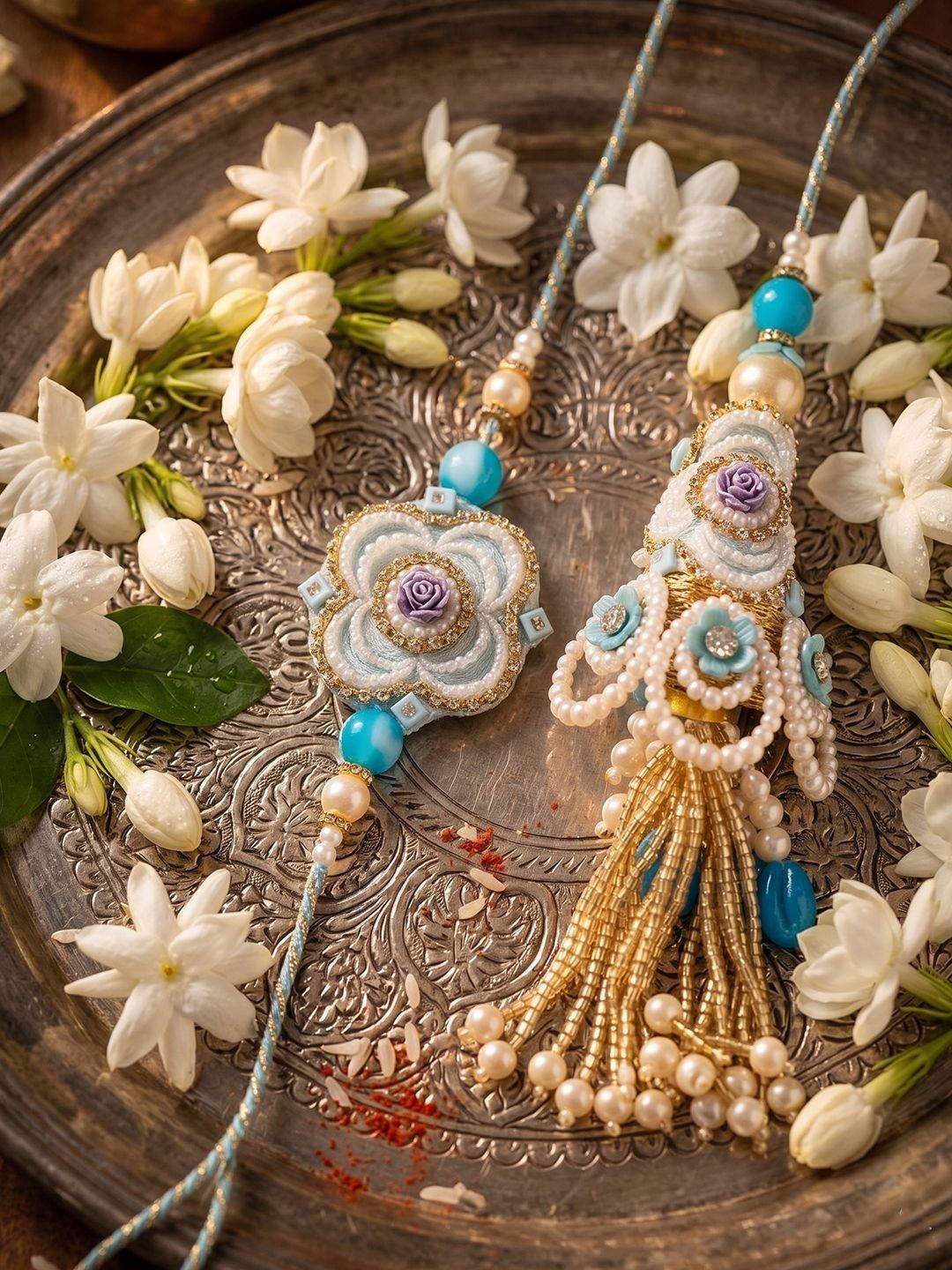 Dhiyona Set Of 2 Pearls & Artificial Stones Floral Bhaiya Bhabhi Rakhi With Roli Chawal