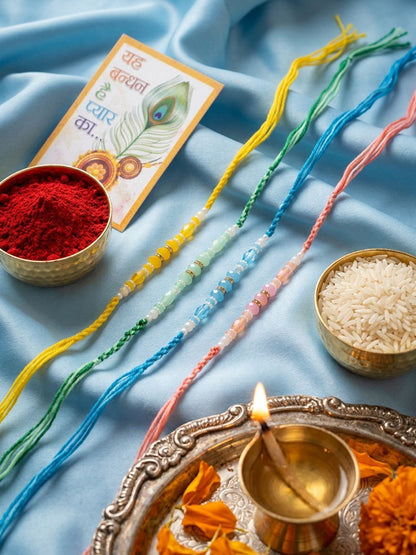 Dhiyona Set Of 4 Multicolor Artificial Beads Thread Rakhi With Roli Chawal Chandan Mishri
