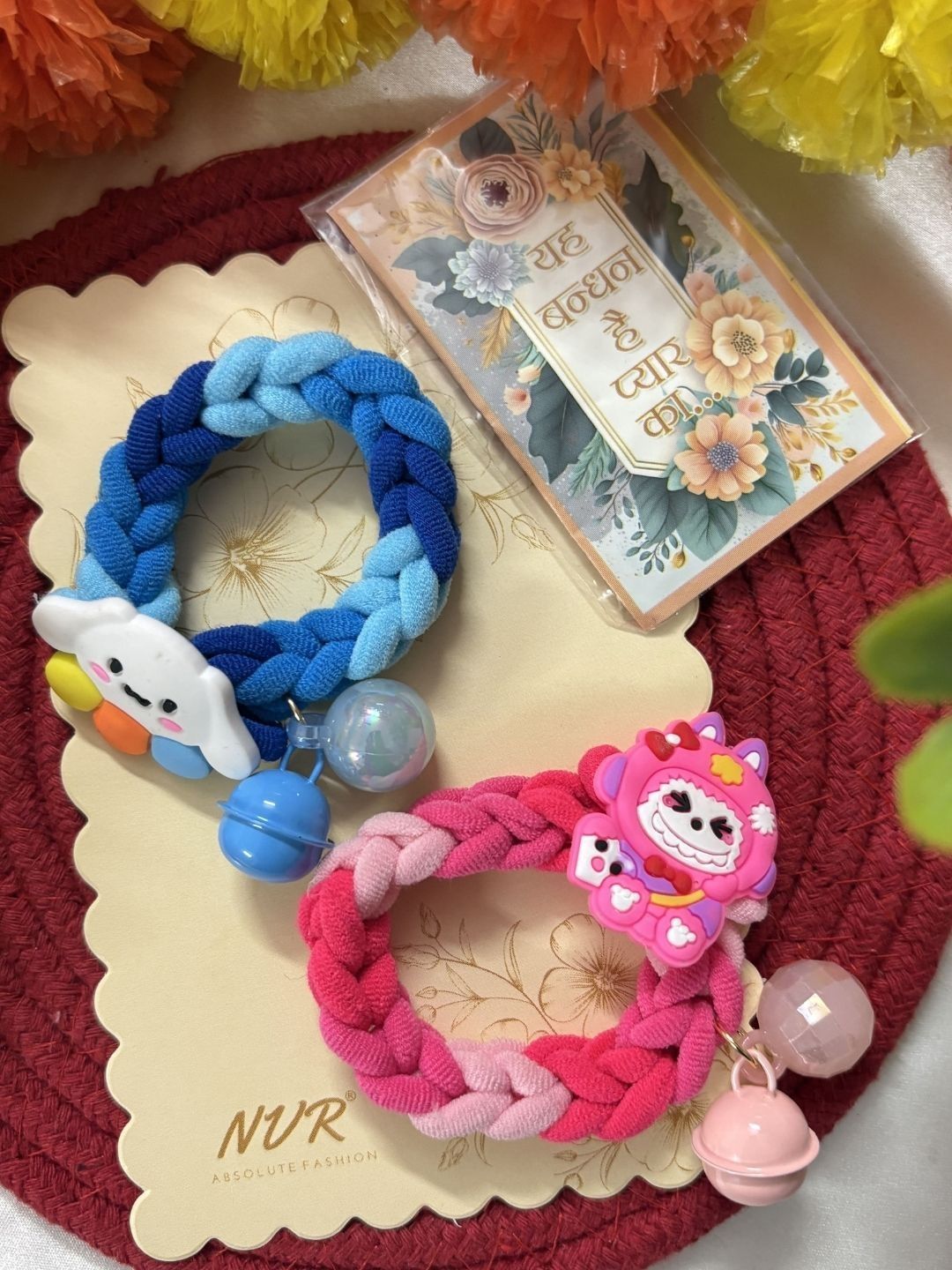 Dhiyona Set Of 2 Blue & Pink Kids Rakhi With Roli Chawal Chandan Mishri