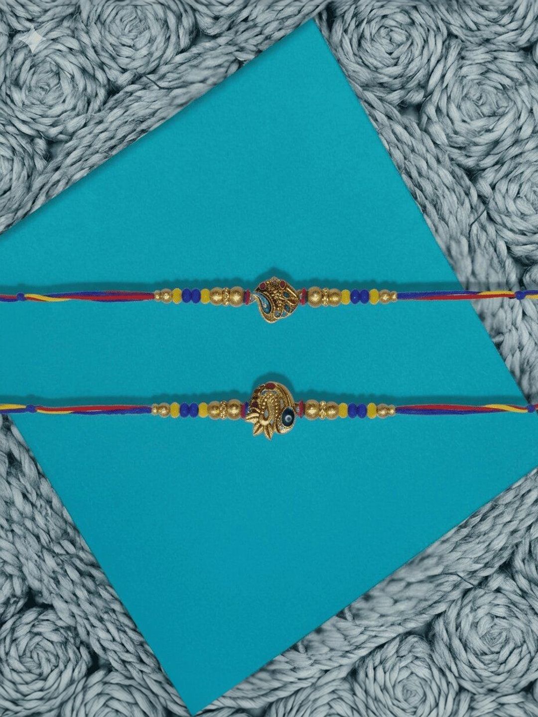 Dhiyona Set Of 2 Peacock Design Thread Rakhi With Roli Chawal Chandan Mishri