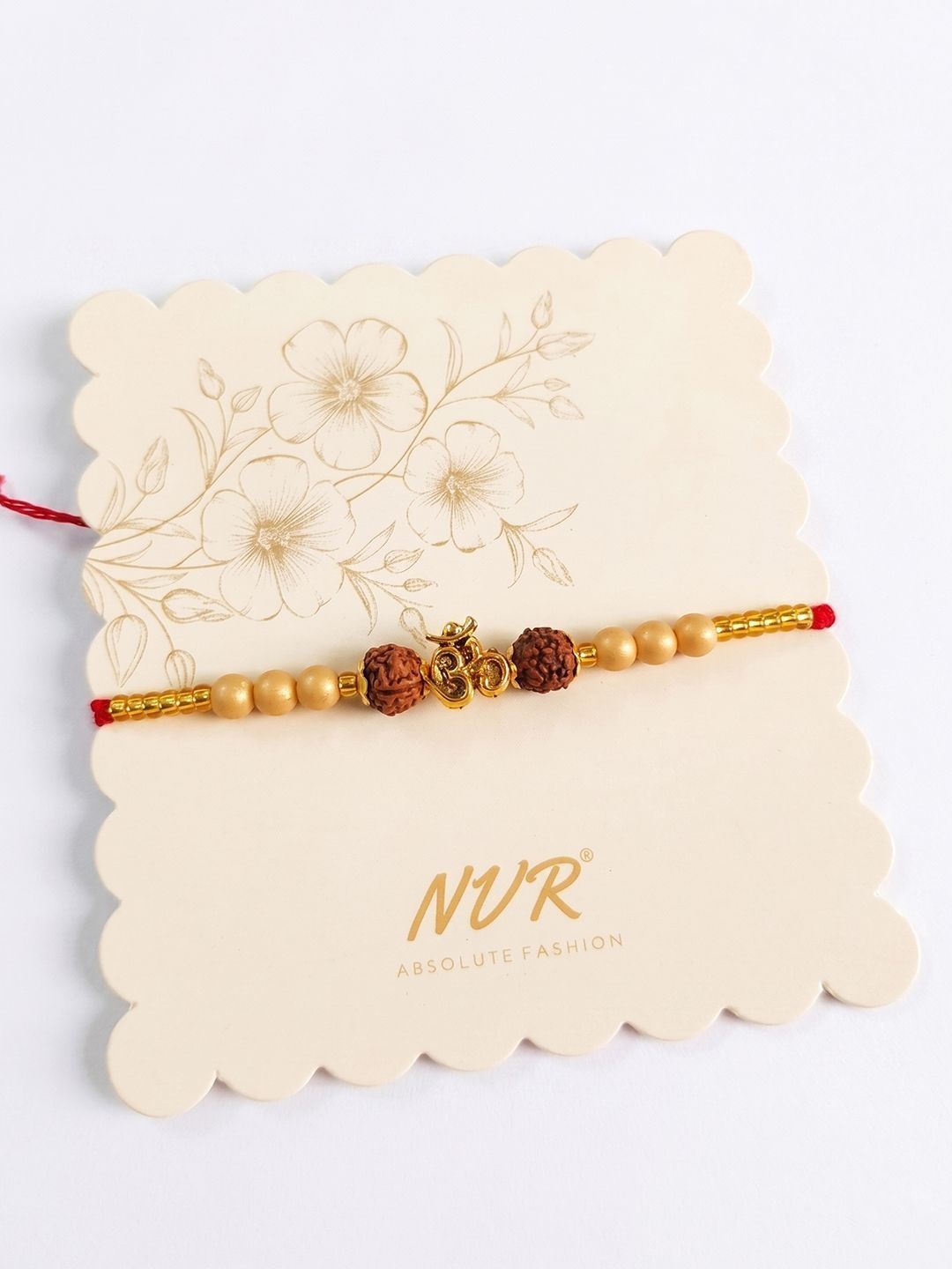 Dhiyona Om Design Rudraksh Thread Rakhi With Roli Chawal Chandan Mishri