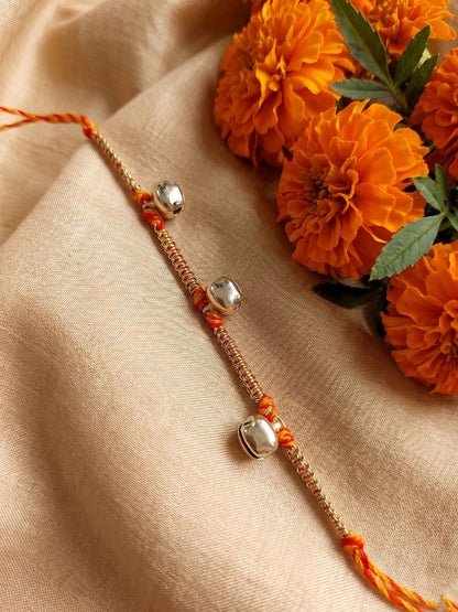 Dhiyona Golden Ghungroo Thread Rakhi With Roli Chawal Chandan Mishri