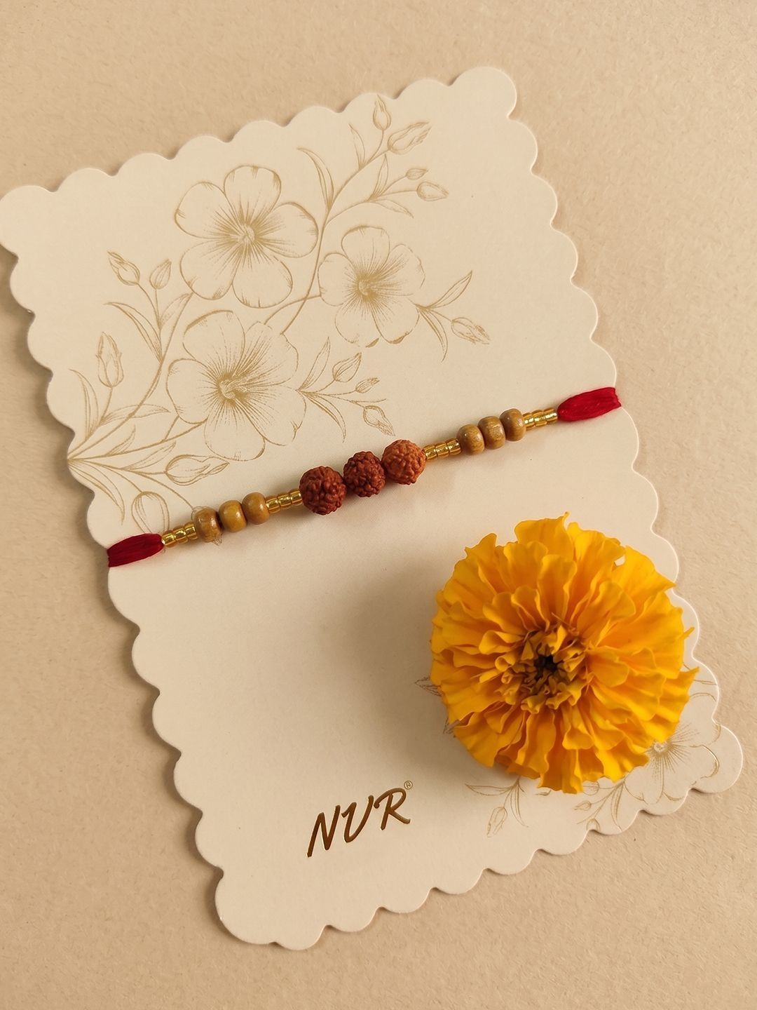 Dhiyona Religious Rudraksh & Red Thread Rakhi With Roli Chawal Chandan Mishri