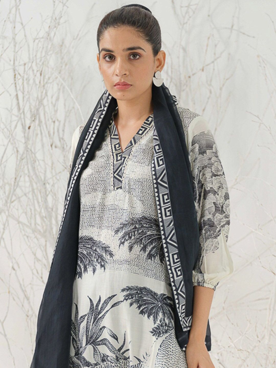 Dhiyona IS Women's Tribal Printed V-Neck Straight Kurta with Trousers & Dupatta