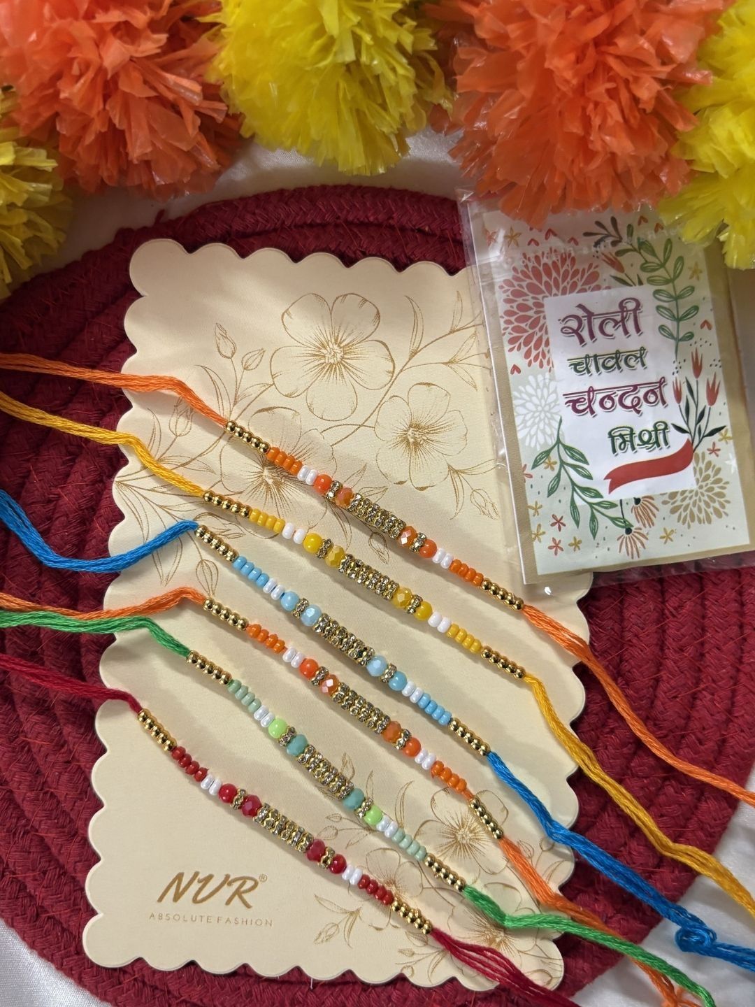 Dhiyona Set Of 6 Multi Artificial Beads Thread Rakhi With Roli Chawal Chandan Mishri
