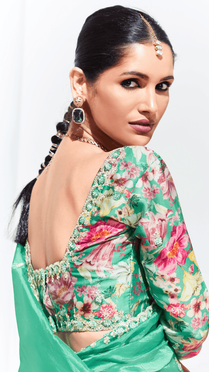Dhiyona KM Women Green Silk Saree With Floral Blouse “ A Perfect Blend Of Grace & Elegancegreen Silk Saree