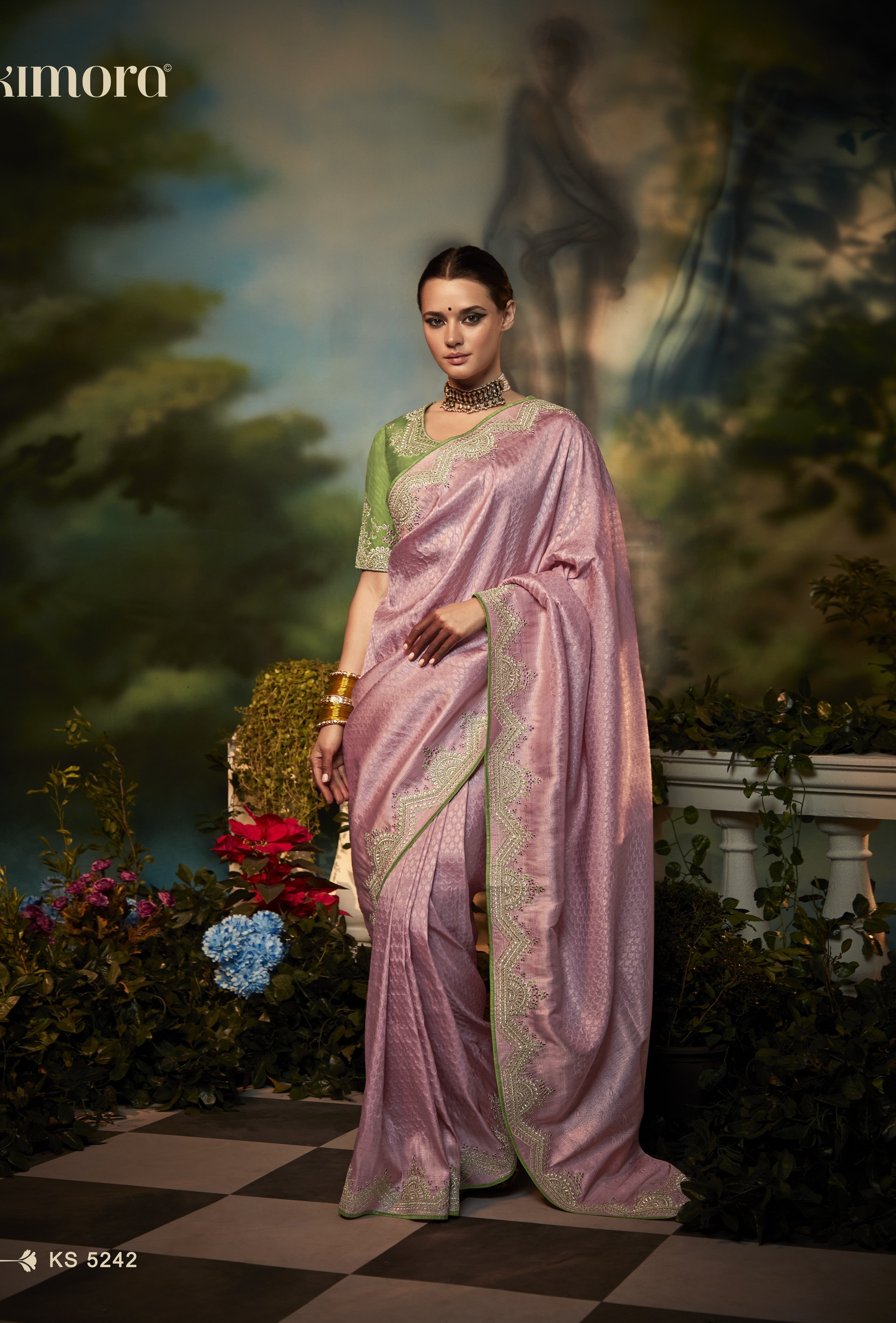 Dhiyona KM Women Pink Silk Saree With Contrasting Green Blouse