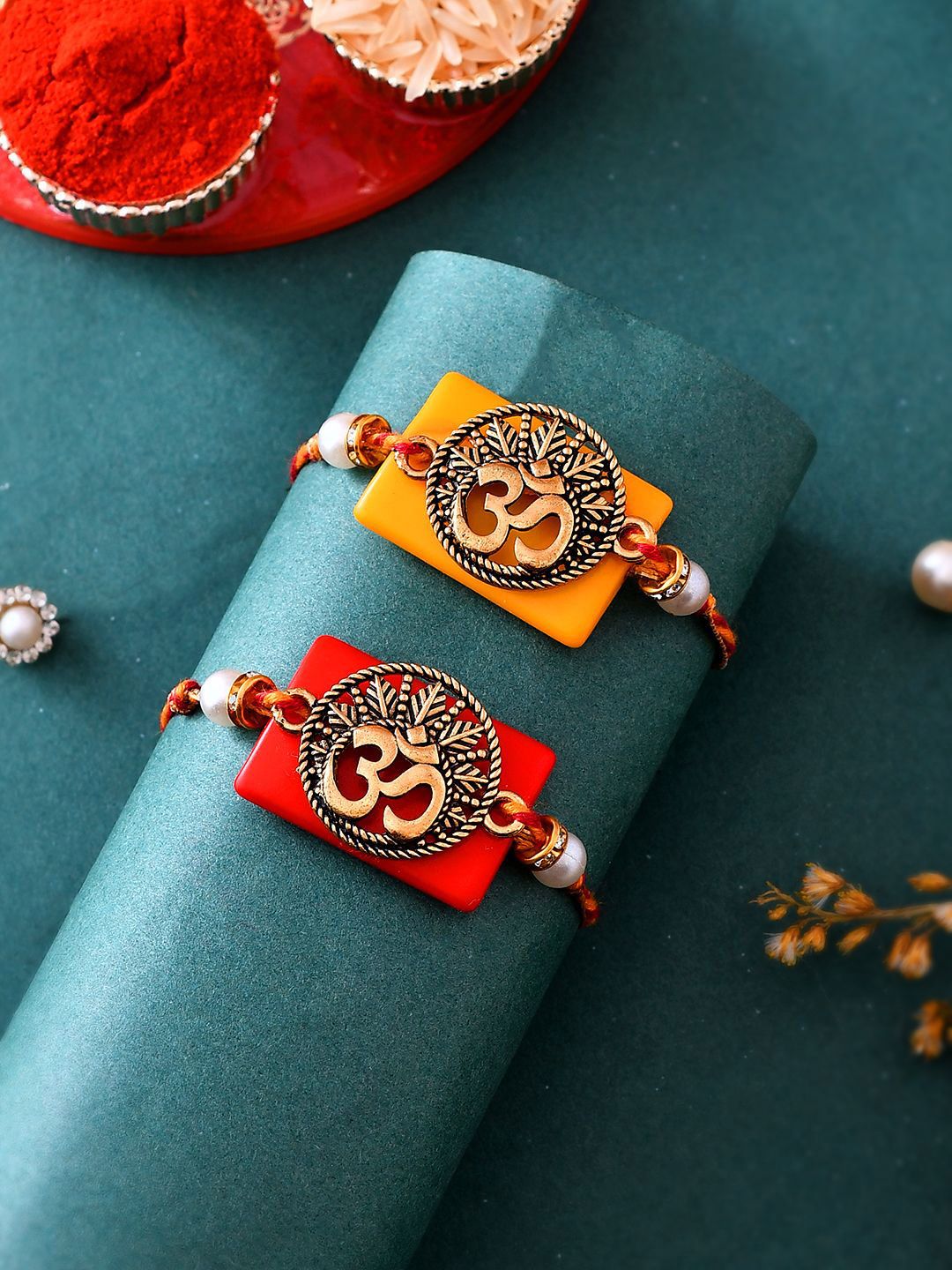 Dhiyona Gold Toned Set Of 2 Om Charm Thread Rakhis With Roli Chawal & Greeting Card