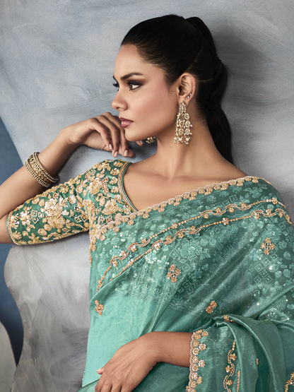 Dhiyona KM Women Sea Green Tissue Embroidered Fancy Heavy Border Saree