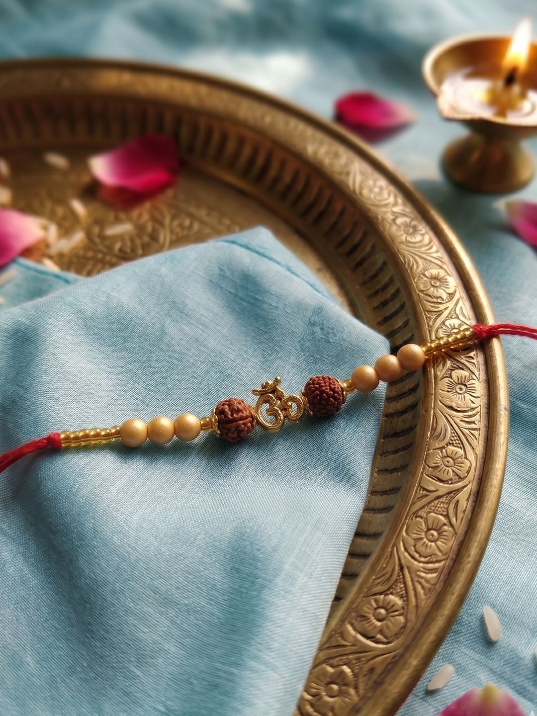 Dhiyona Om Design Rudraksh Thread Rakhi With Roli Chawal Chandan Mishri