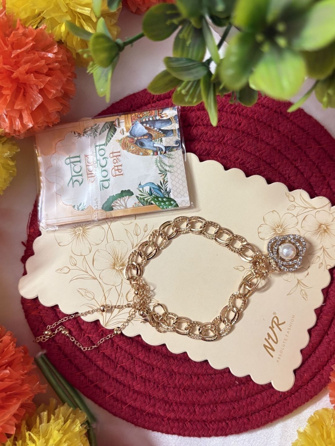 Dhiyona Women Gold Plated Ad Bracelet Rakhi With Roli Chawal Chandan Mishri