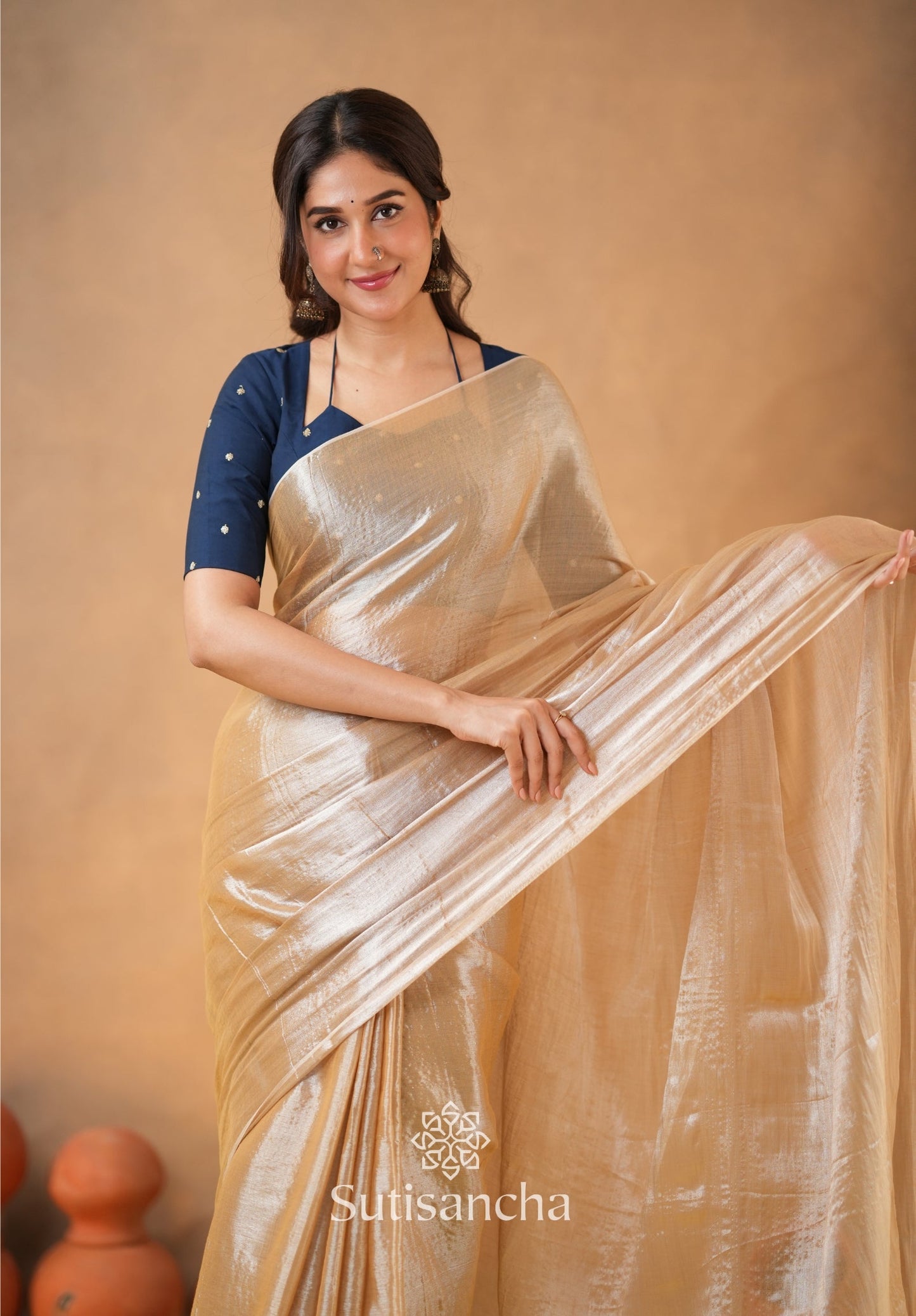 Dhiyona SS Ivory Gold Horizon – Flowing with Regal Charm
