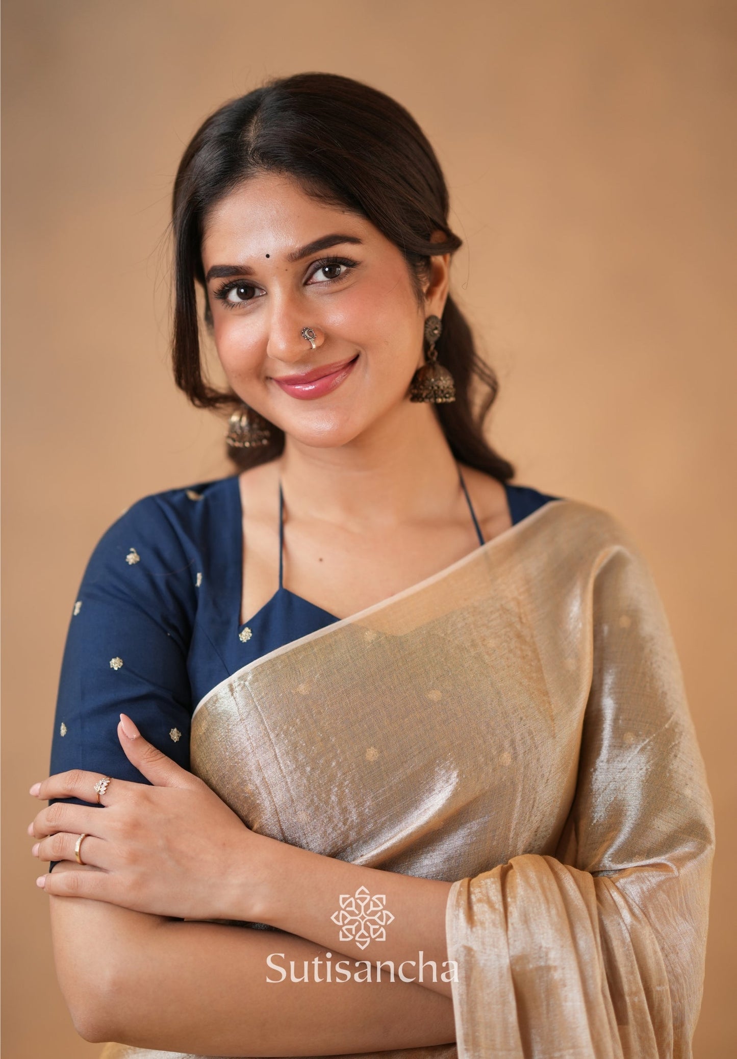 Dhiyona SS Ivory Gold Horizon – Flowing with Regal Charm