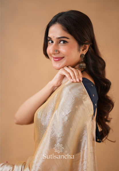 Dhiyona SS Ivory Gold Horizon – Flowing with Regal Charm