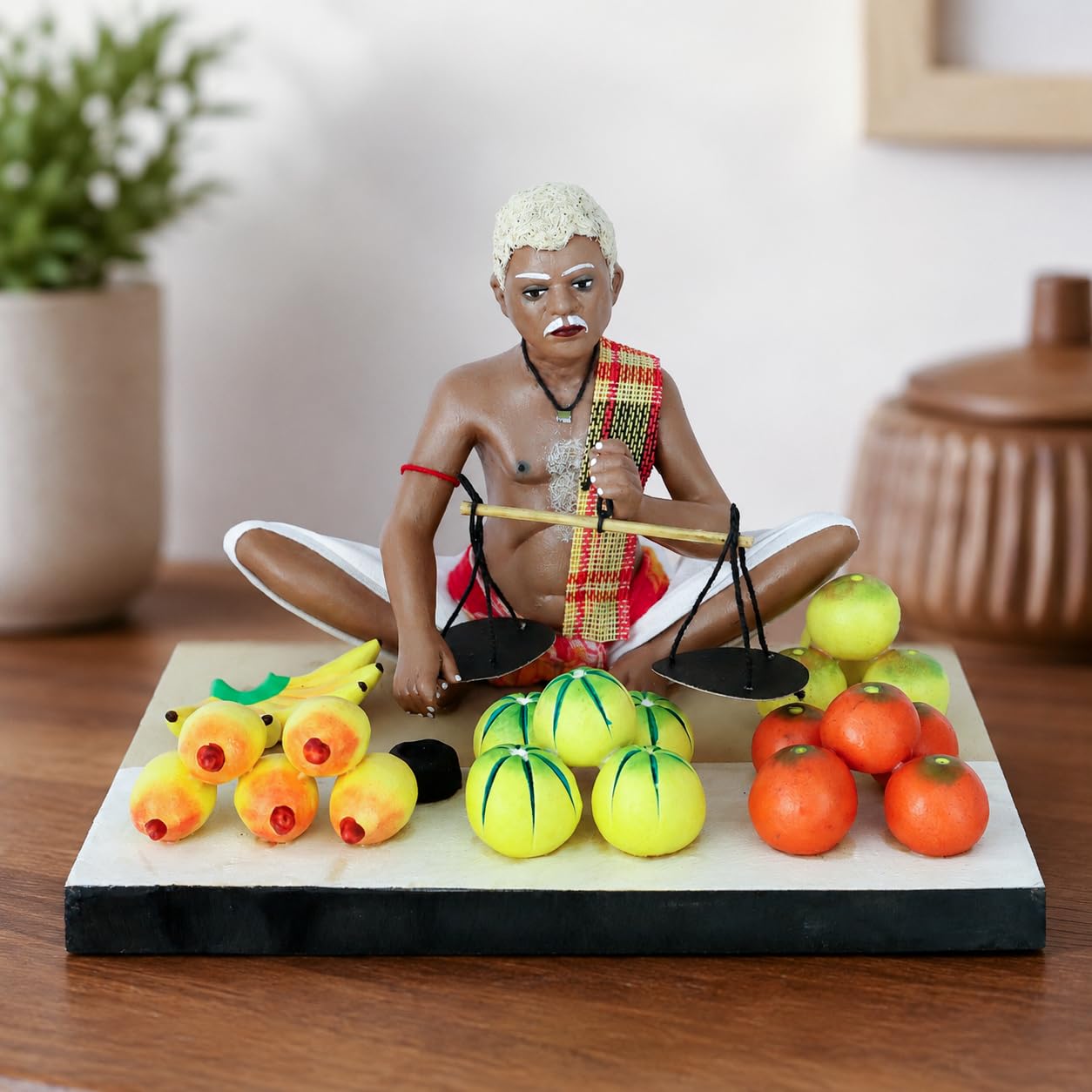 Niharika Collections Krishnanagar Handmade Clay Fruit Seller Idol, Sitting Human Figure Miniature,Hand-Painted Indian Art, Multicolour Home Décor,Golu Display & Gifting-15.2 x 10.2 x 10.2 cm