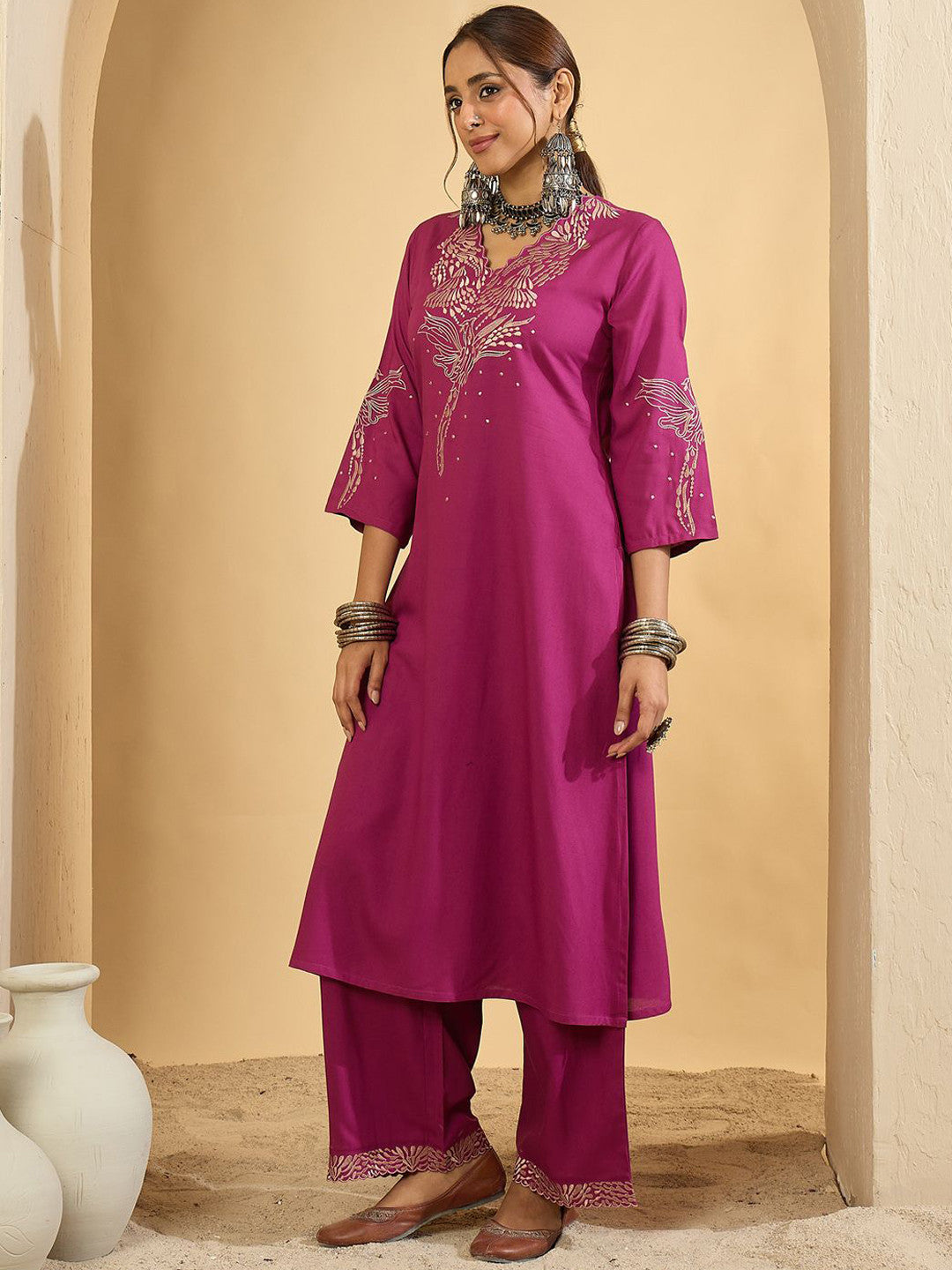 Women Embroidered Regular Thread Work Kurta with Trousers